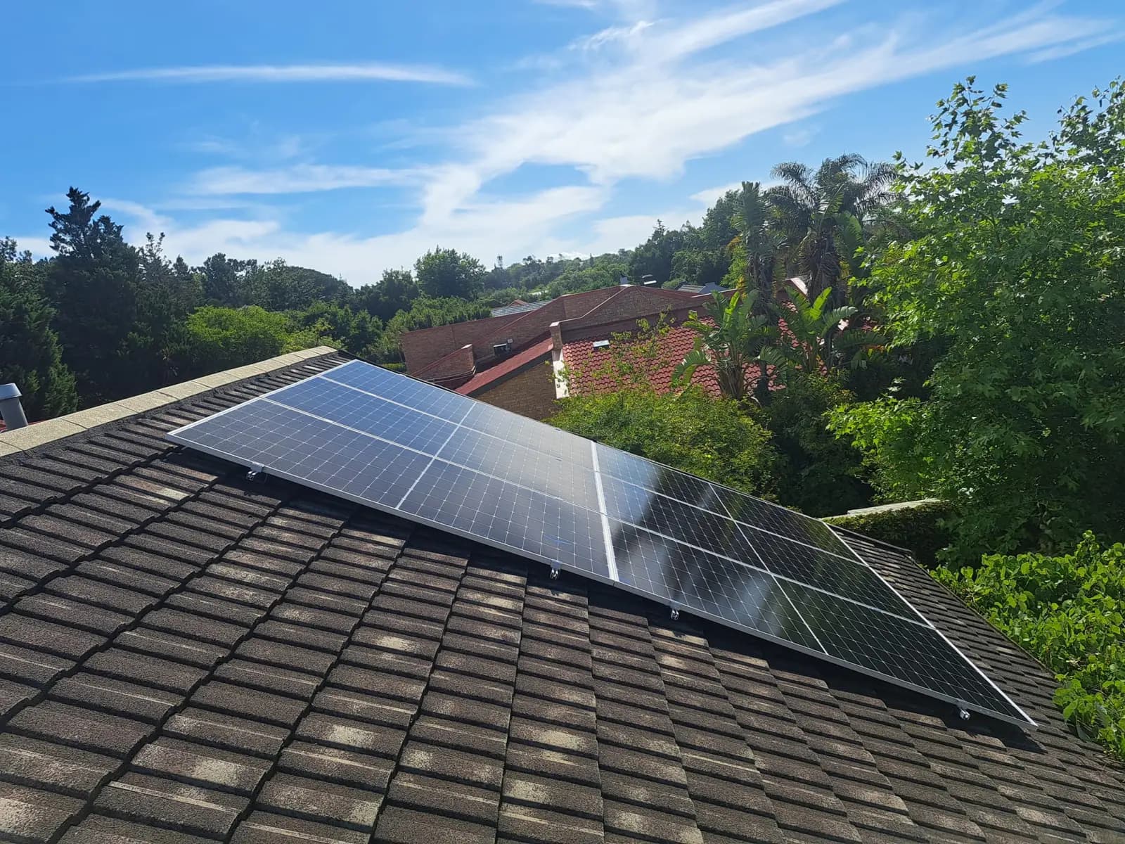 Rooftop solar panel array installation in Cape Town's Northern Suburbs