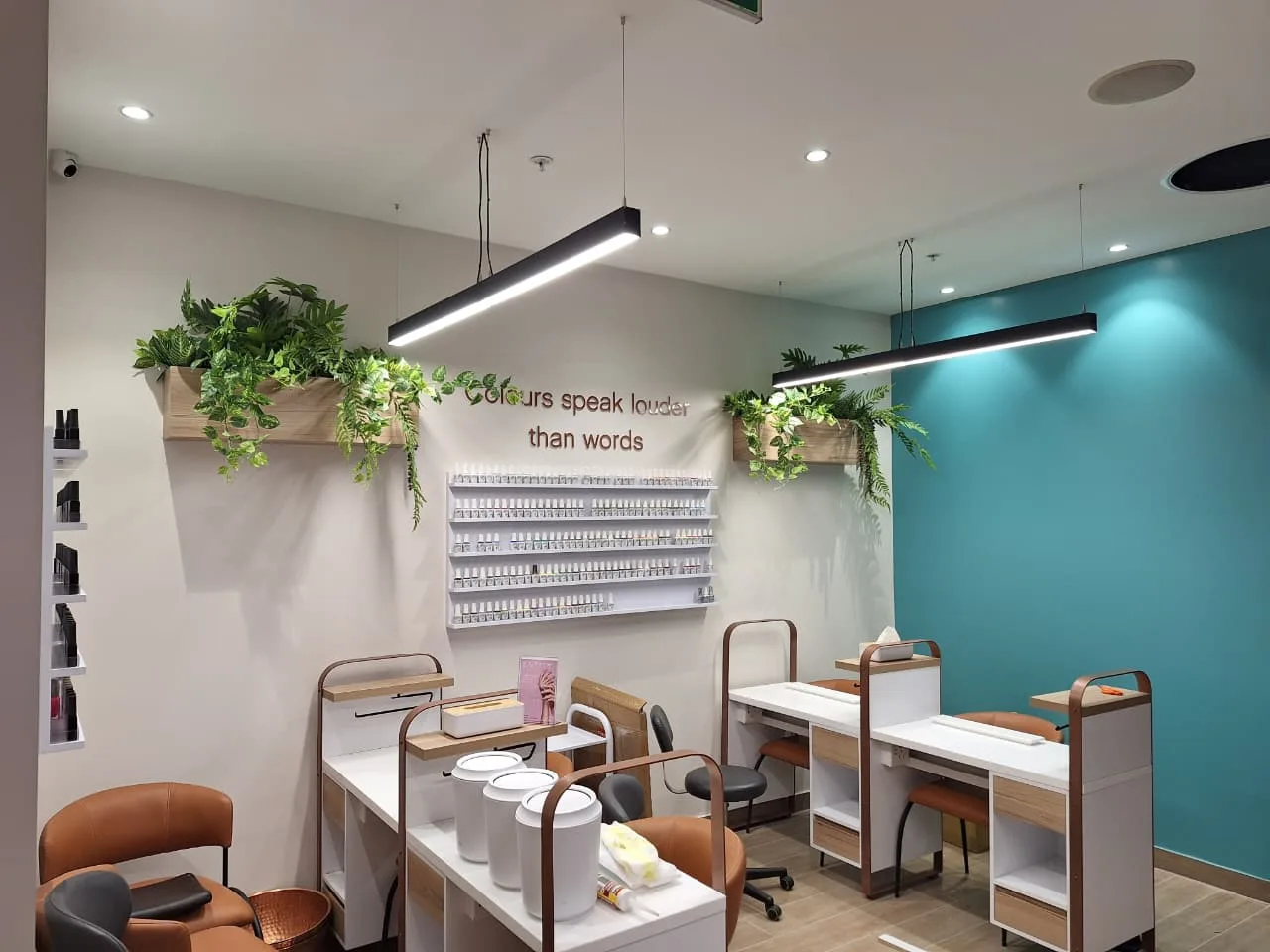 Linear LED lighting installed above retail workstations